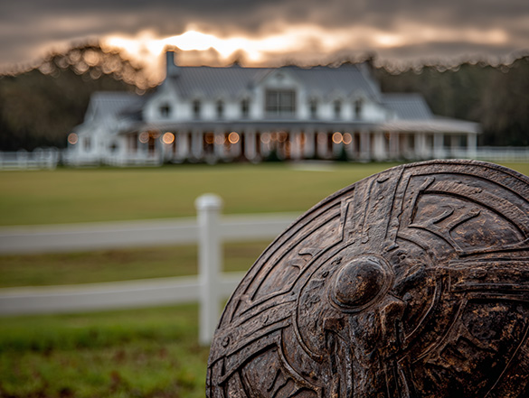 shield in front of a home representing title insurance.